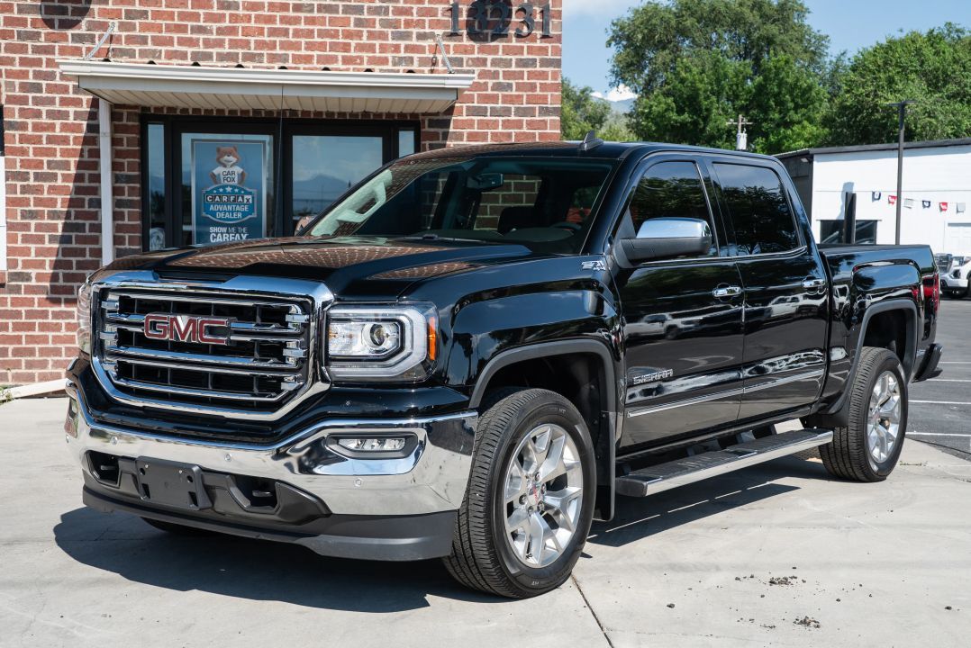 2018 GMC 1500 SLT — rebuilt & branded title, 2% below market