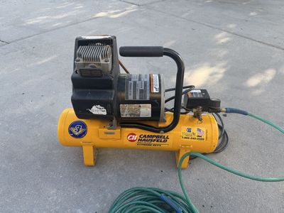 Air compressor with hose