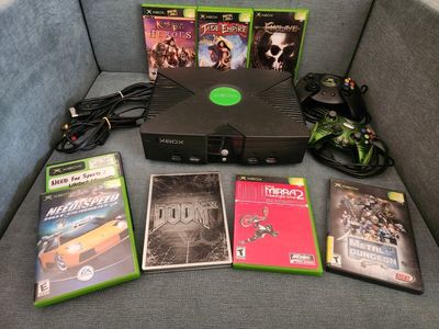 original xbox w/ cords, 2 controllers, 8 games