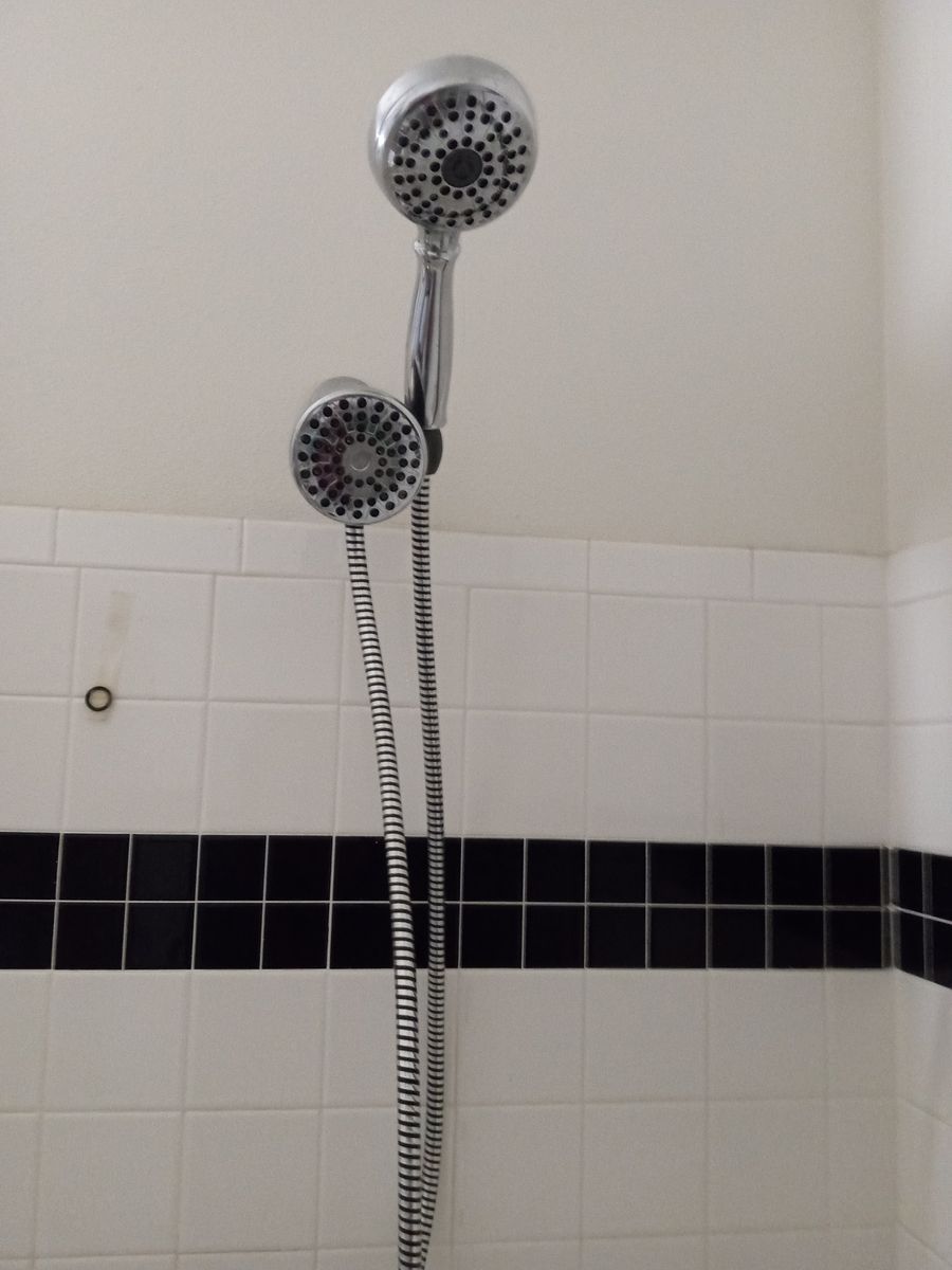 Water pic power pulse dual handheld and stationary shower heads