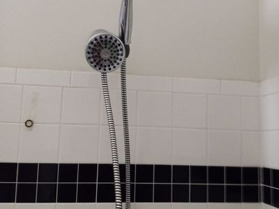Water pic power pulse dual handheld and stationary shower heads