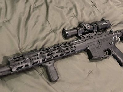 Modded Krytac MK2 SPR, with mags and attachments