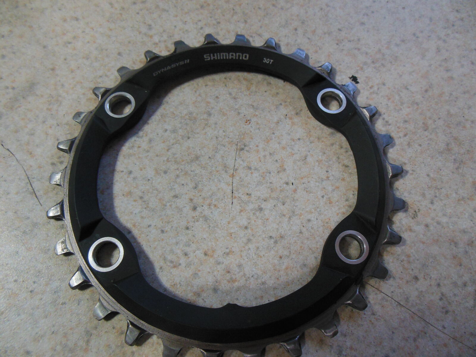 Shimano 1×, 11 speed 30 tooth chainring.