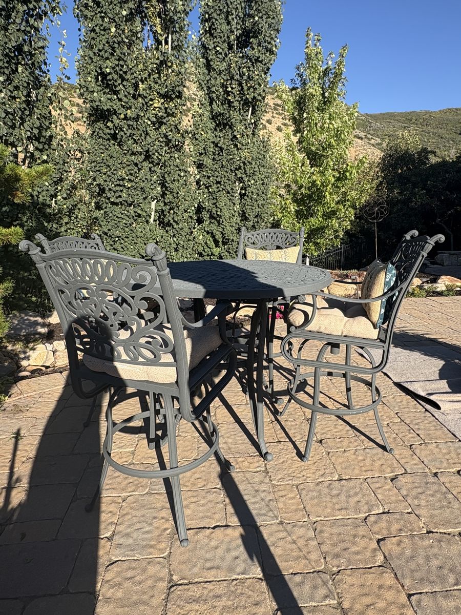 Bar height table and 4 chairs