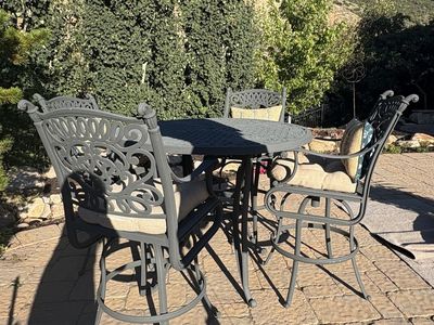 Bar height table and 4 chairs