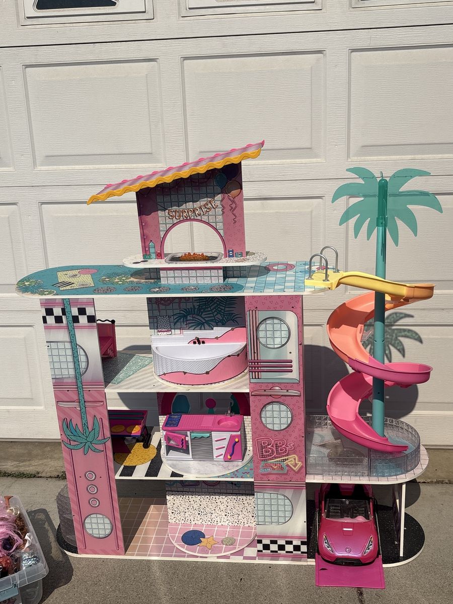L.O.L. Surprise! O.M.G. House of Surprises 4-Ft Wooden Dollhouse w/ Pool & Slide