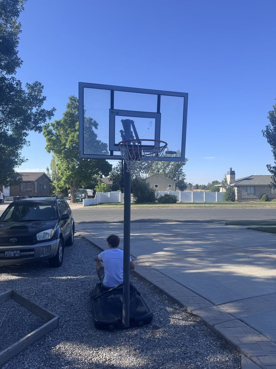 Adjustable basketball stand