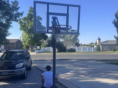 Adjustable basketball stand