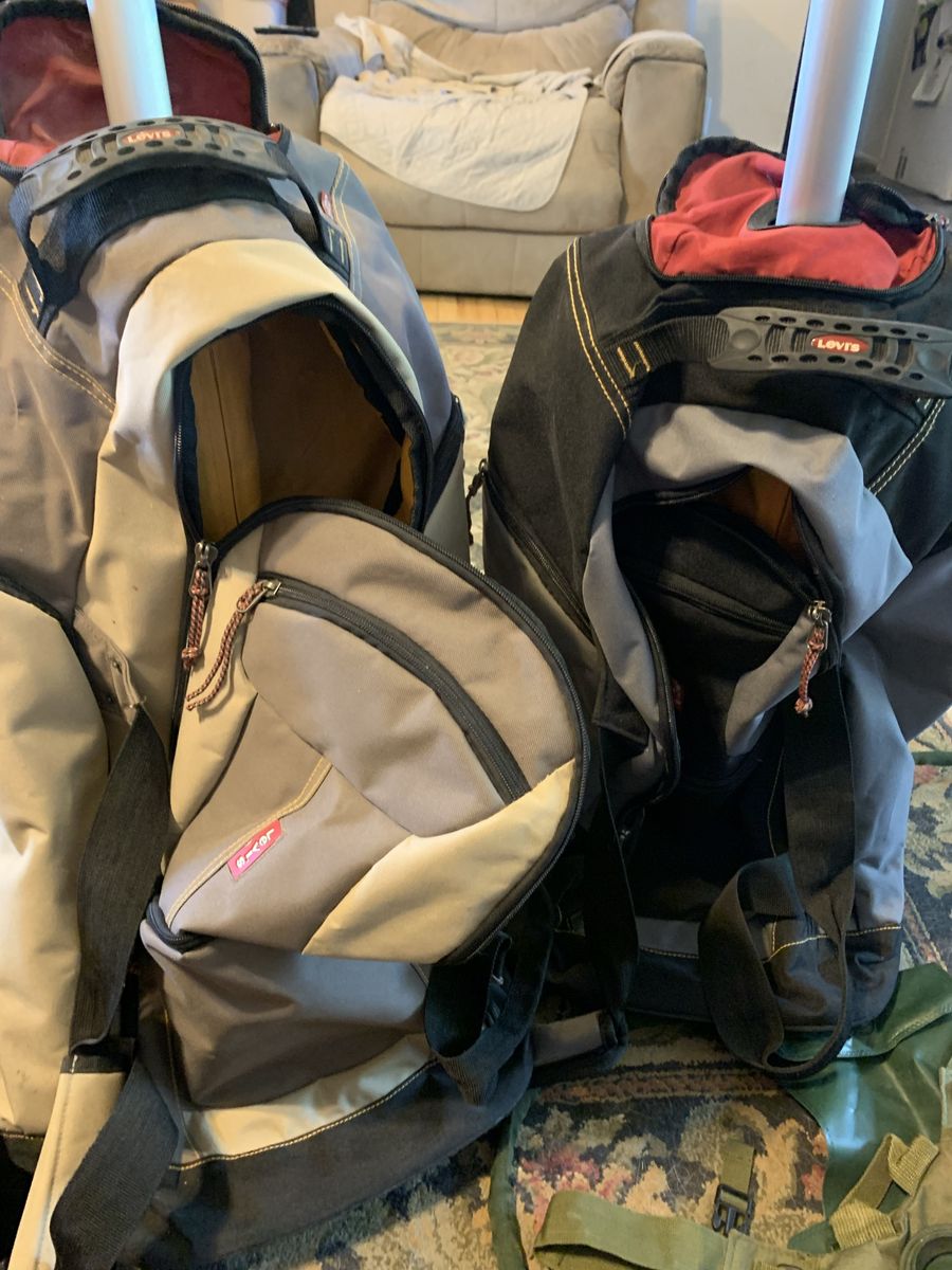 2  Levi travel roller duffle bags, travel bag, wheels, rolling suitcase