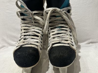 Euro sport 201 black/white trim size 6 hockey skates.