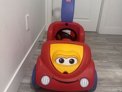 Step2 Ride-On Push Around Red Buggy Car for Toddlers with Blue Handle