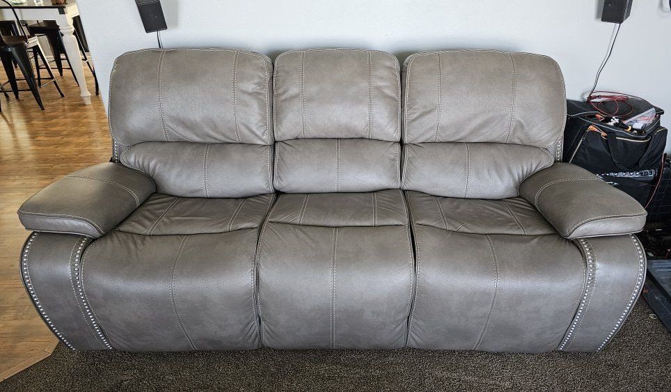 RC Willey Faux Leather Reclining Couch
