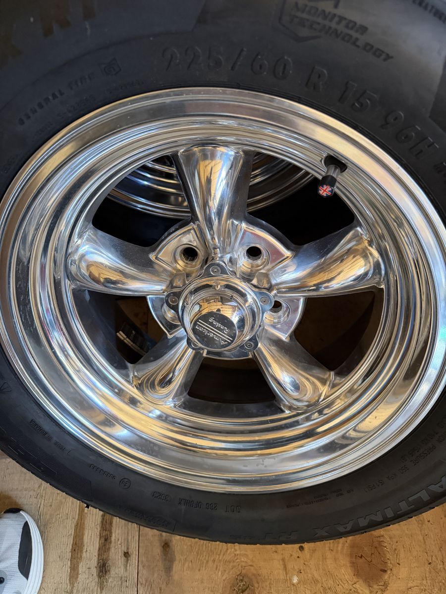 2 new American Racing Torq Thrust Wheels 5x4.5 bolt pattern with new tires