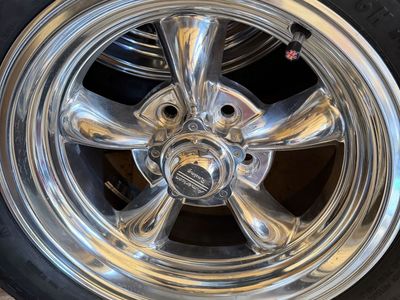 2 new American Racing Torq Thrust Wheels 5x4.5 bolt pattern with new tires