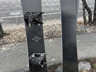 Black Snowboard with Flow Bindings - New never used Snowboards for Sale