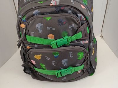 Minecraft Gray Backpack with Green Straps and Multi-Compartment Design