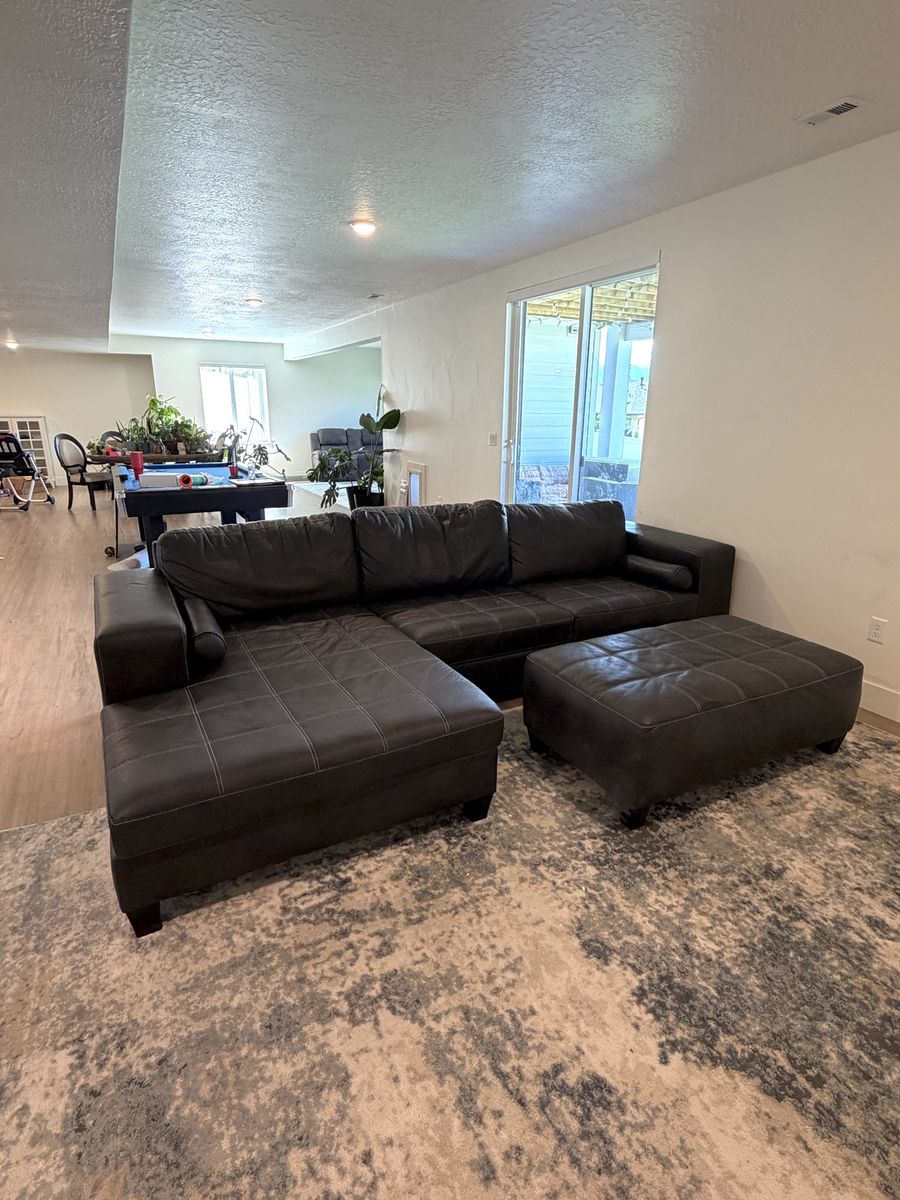 Dark Grey pullout leather Leather Sectional Sofa w/ Chaise, Matching Ottoman