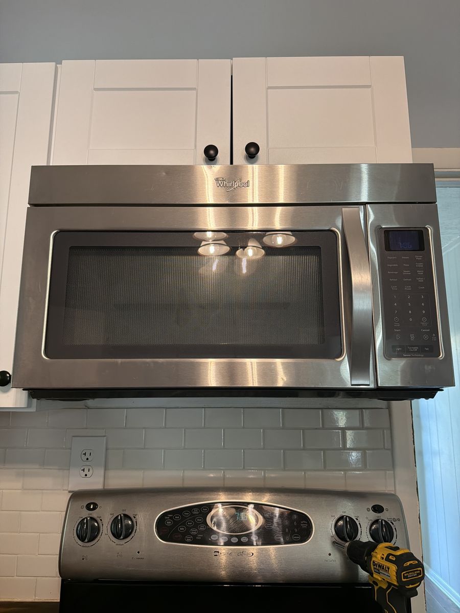 Whirlpool Stainless Steel Over-the-Range Microwave - Good Condition