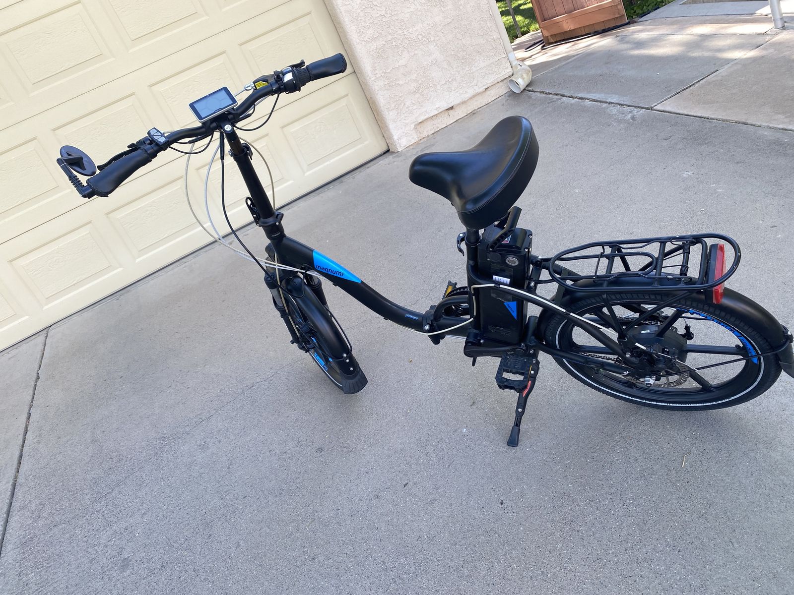 2 Magnum Foldable 20" E-Bikes - Good Condition, One Battery Needs Replacement