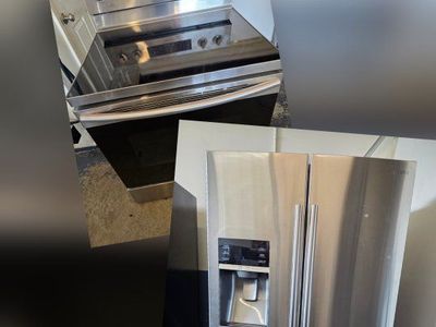 Samsung refrigerator and electric stove.