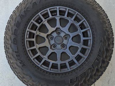 15" rhino wheel w/ Falken Wild Peak tire