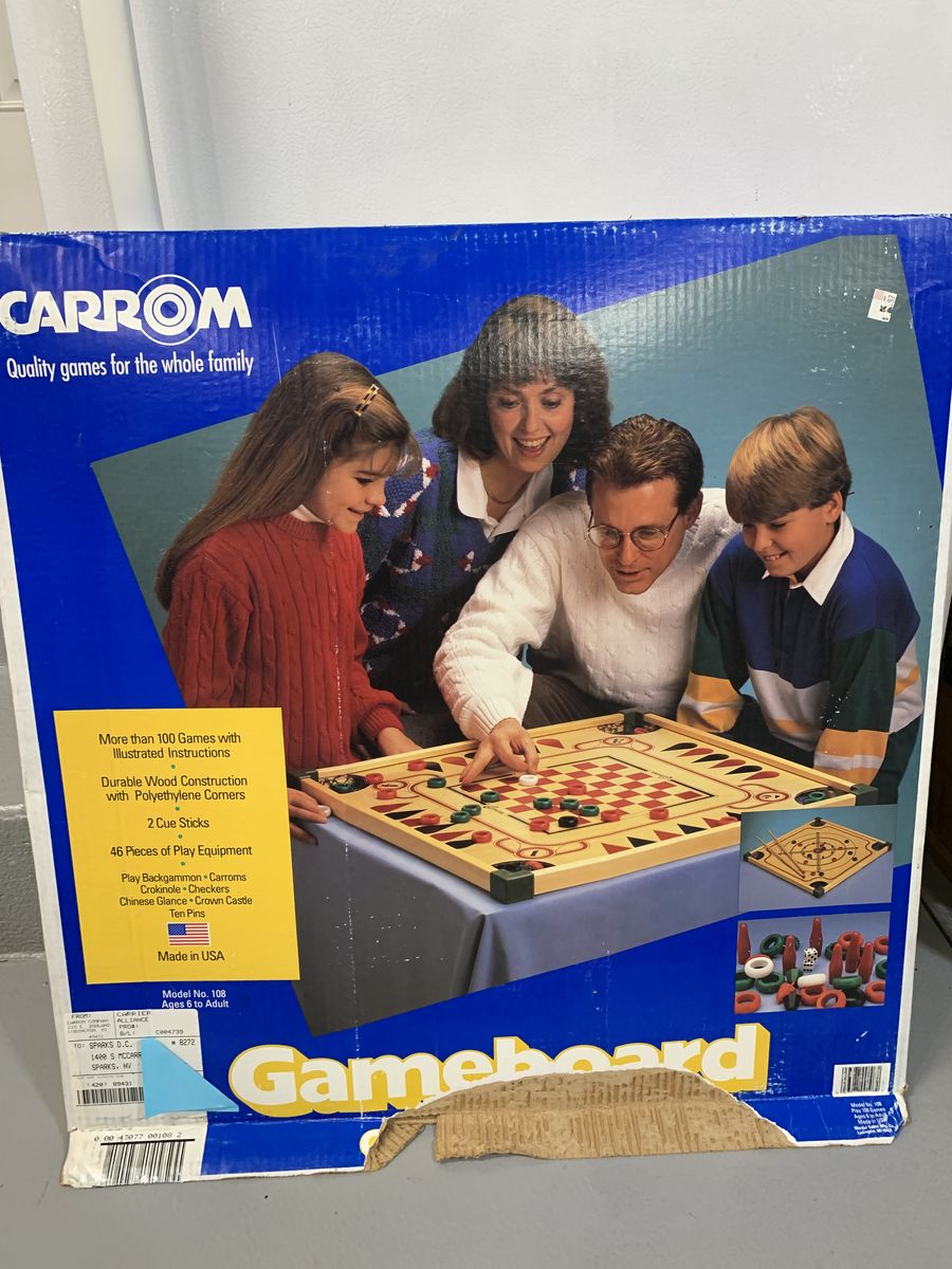 Carrom Gameboard with game pieces