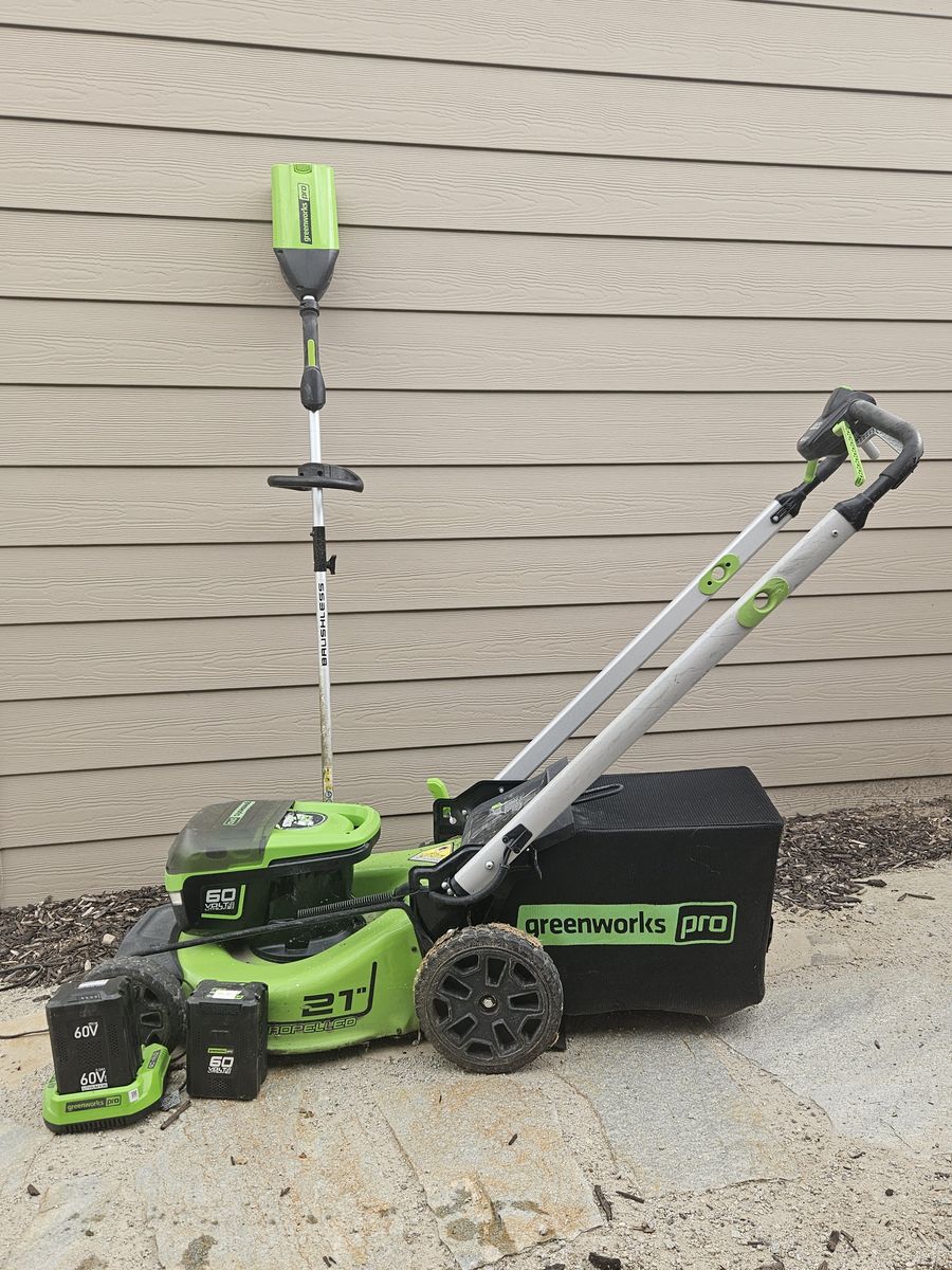 Greenworks lawn mower and weed eater with rechargeable batteries 