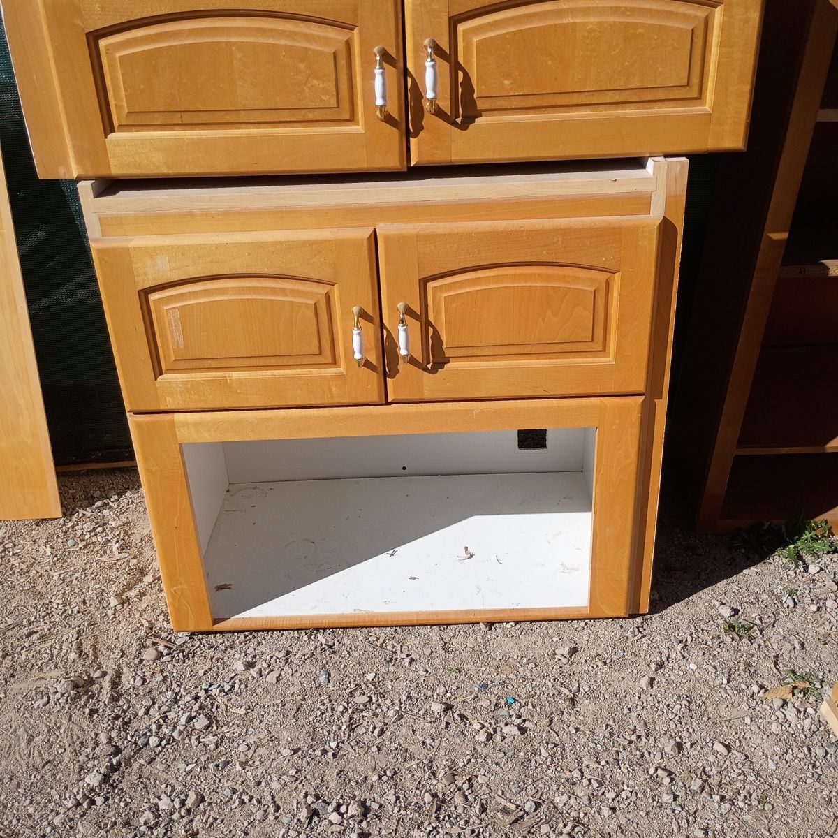 microwave and fridge cabinets