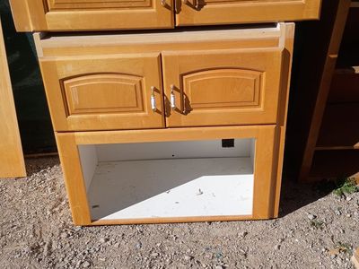 microwave and fridge cabinets