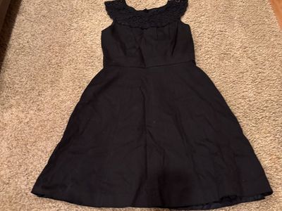 Cute sleeveless women’s size 10 black dress