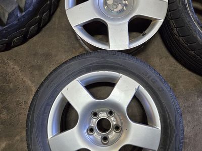 (2) audi 16" wheels one has a tire