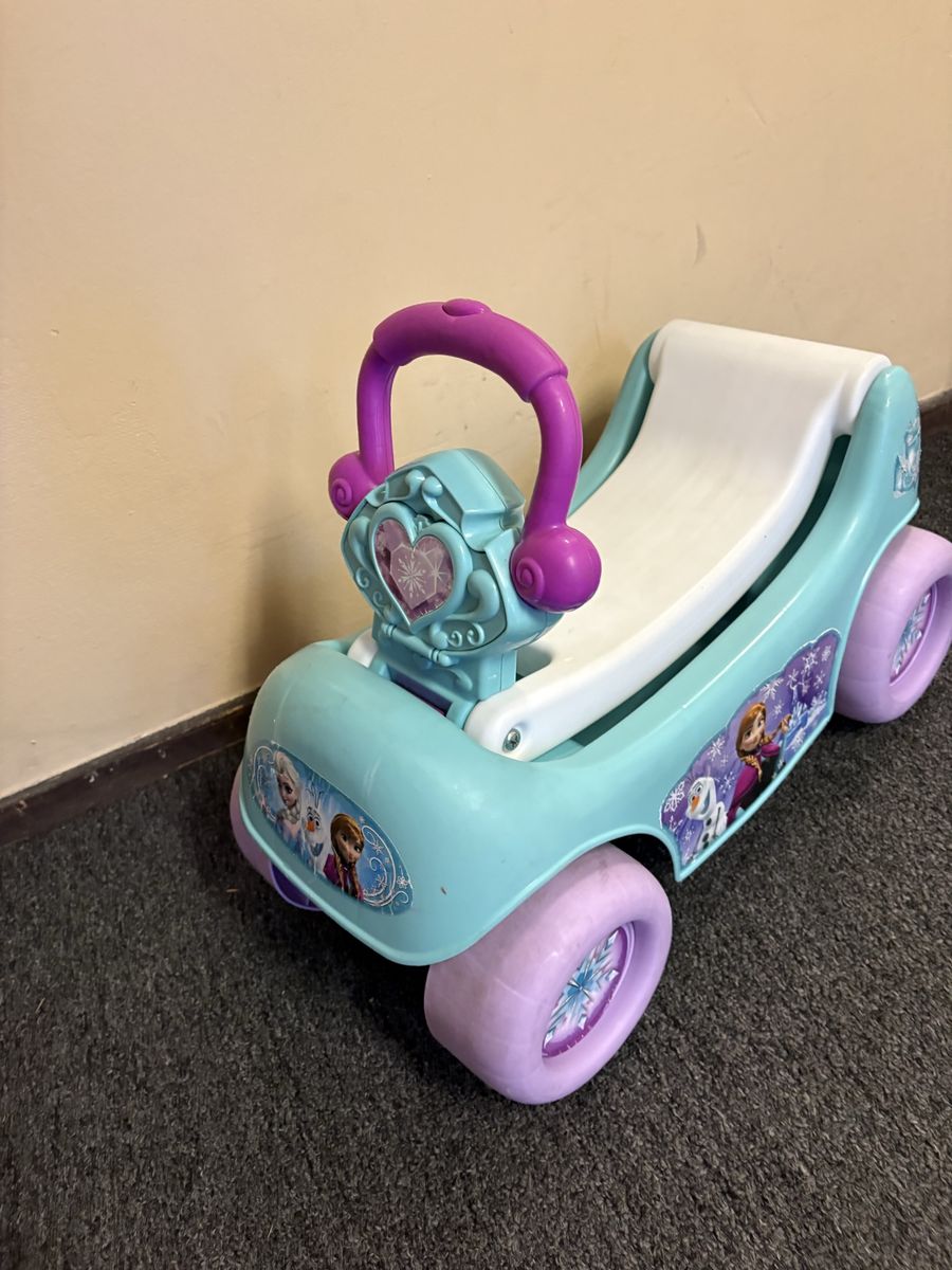 Frozen Elsa & Anna ride & push along toy.