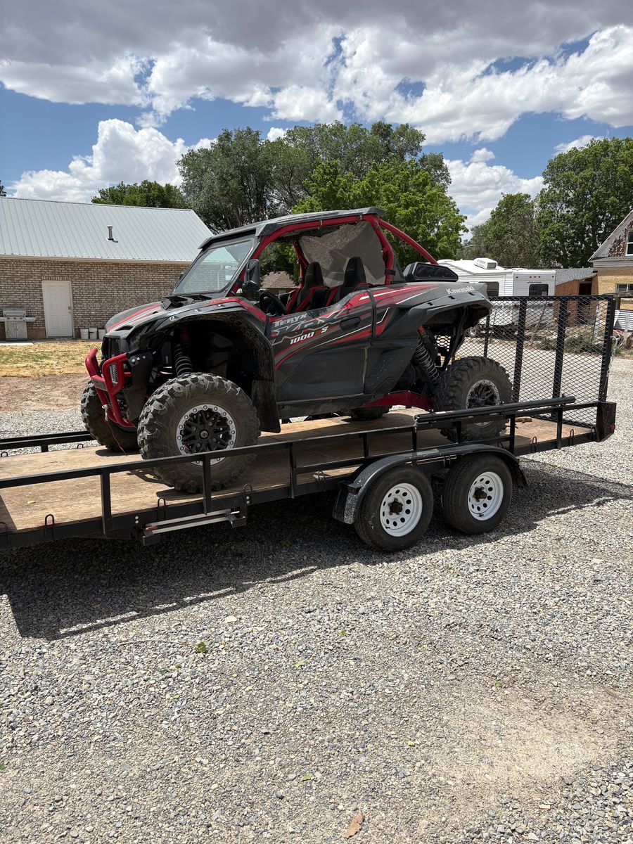 Sturdy Dual-Axle UTV/ATV Trailer with Ramp - Perfect for Hauling Your Toys