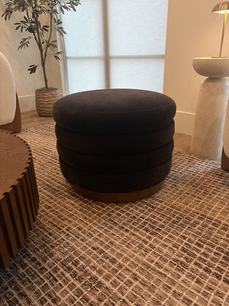 Chocolate brown ottoman with storage inside  