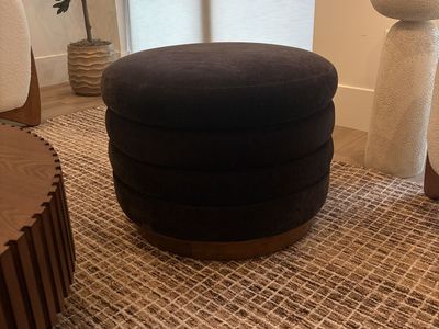 Chocolate brown ottoman with storage inside