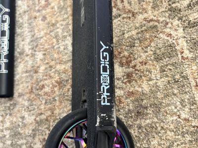 Envy Prodigy trick scooter with reaper bars
