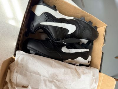 Pair of Black & White Baseball/Softball Cleats with a fold-over tongue