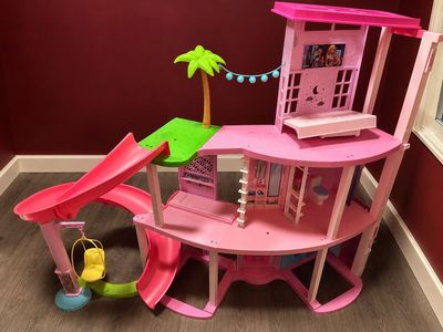 Barbie Dreamhouse Dollhouse with Pool, Slide, and Accessories