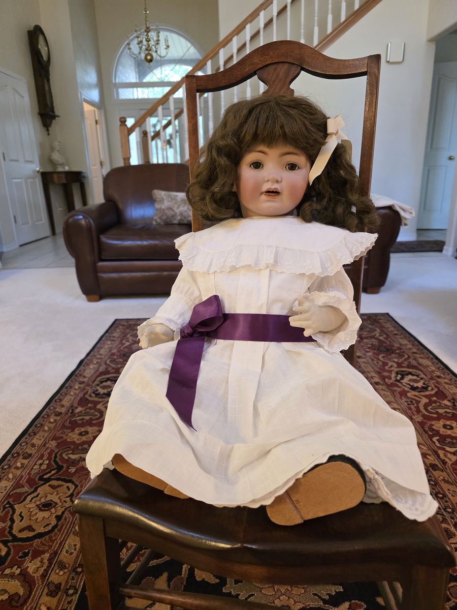 Rare antique doll and chair