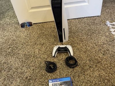 Sony PlayStation 5 Disc Edition Console with DualSense Controller & Call of Duty Modern Warfare PS4
