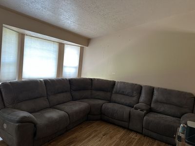 6 piece Dark Brown Power Reclining Sectional Sofa with Cup Holders and Storage Console