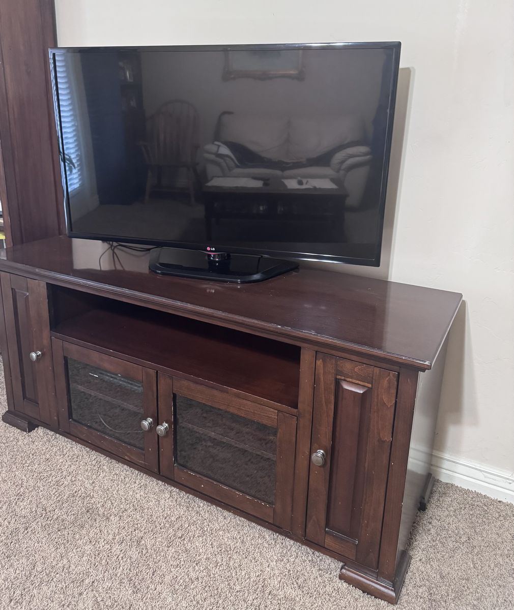 LG Smart TV and Wooden TV Stand Console