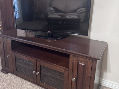 LG Smart TV and Wooden TV Stand Console