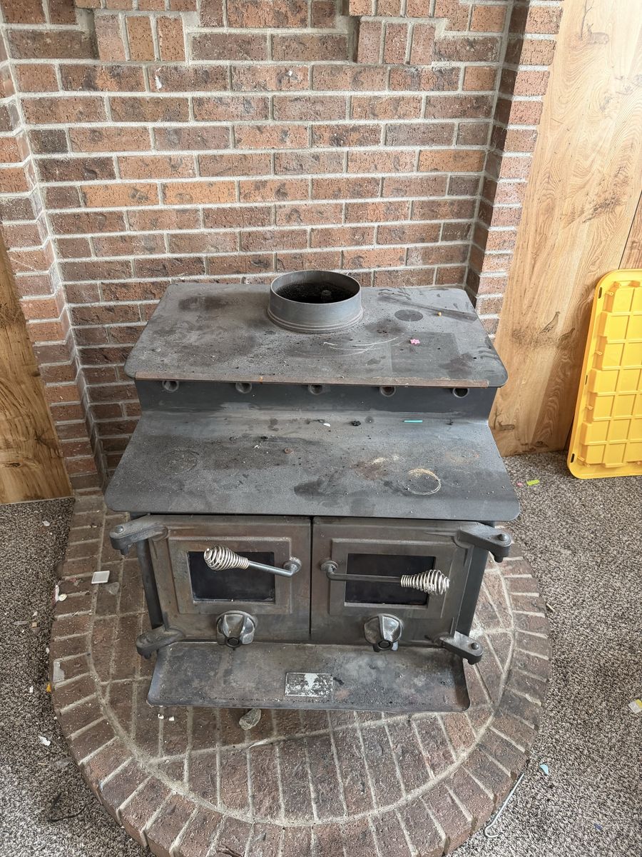 Wood Stove + Pipe (England Stove Works) – As-Is