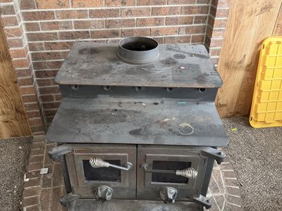Wood Stove + Pipe (England Stove Works) – As-Is