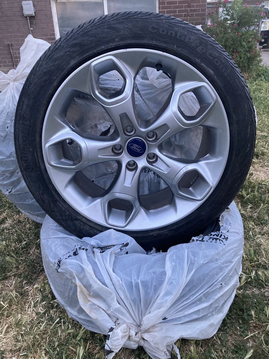 4 tires and rims from ford escape almost new