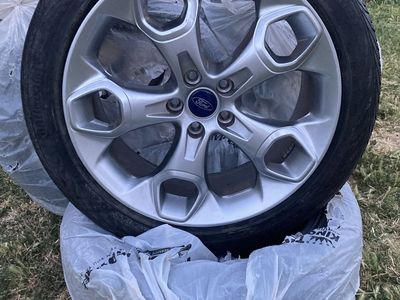 4 tires and rims from ford escape almost new