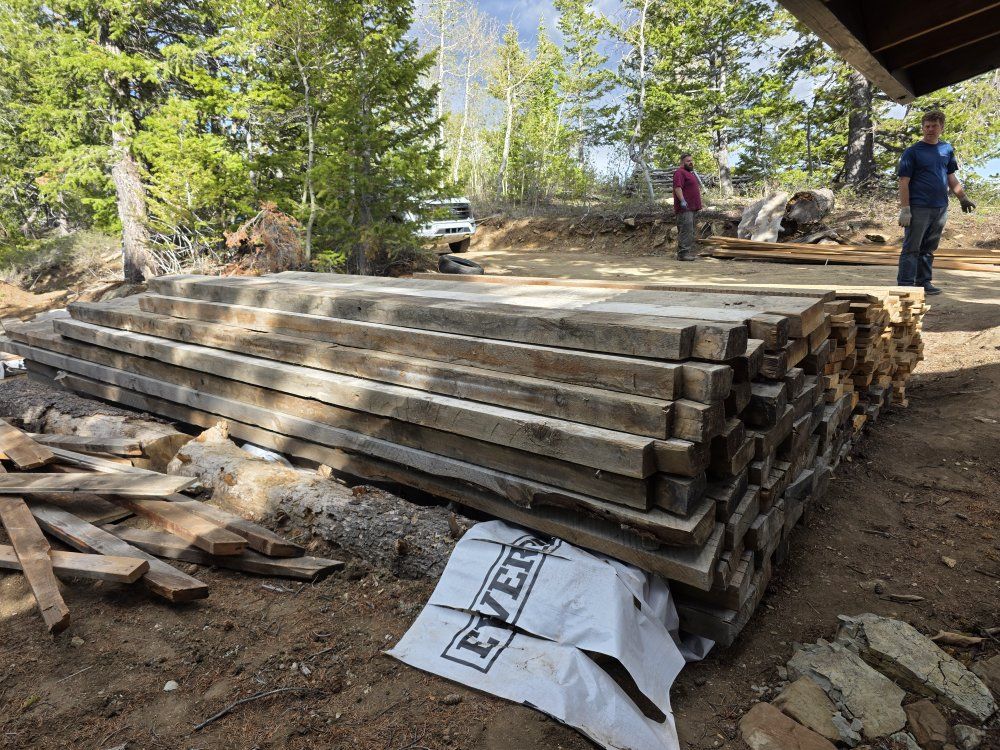 Rustic board from disassembled old cabin. Roughly 4 or 5x11" and about 15-20 feet long.