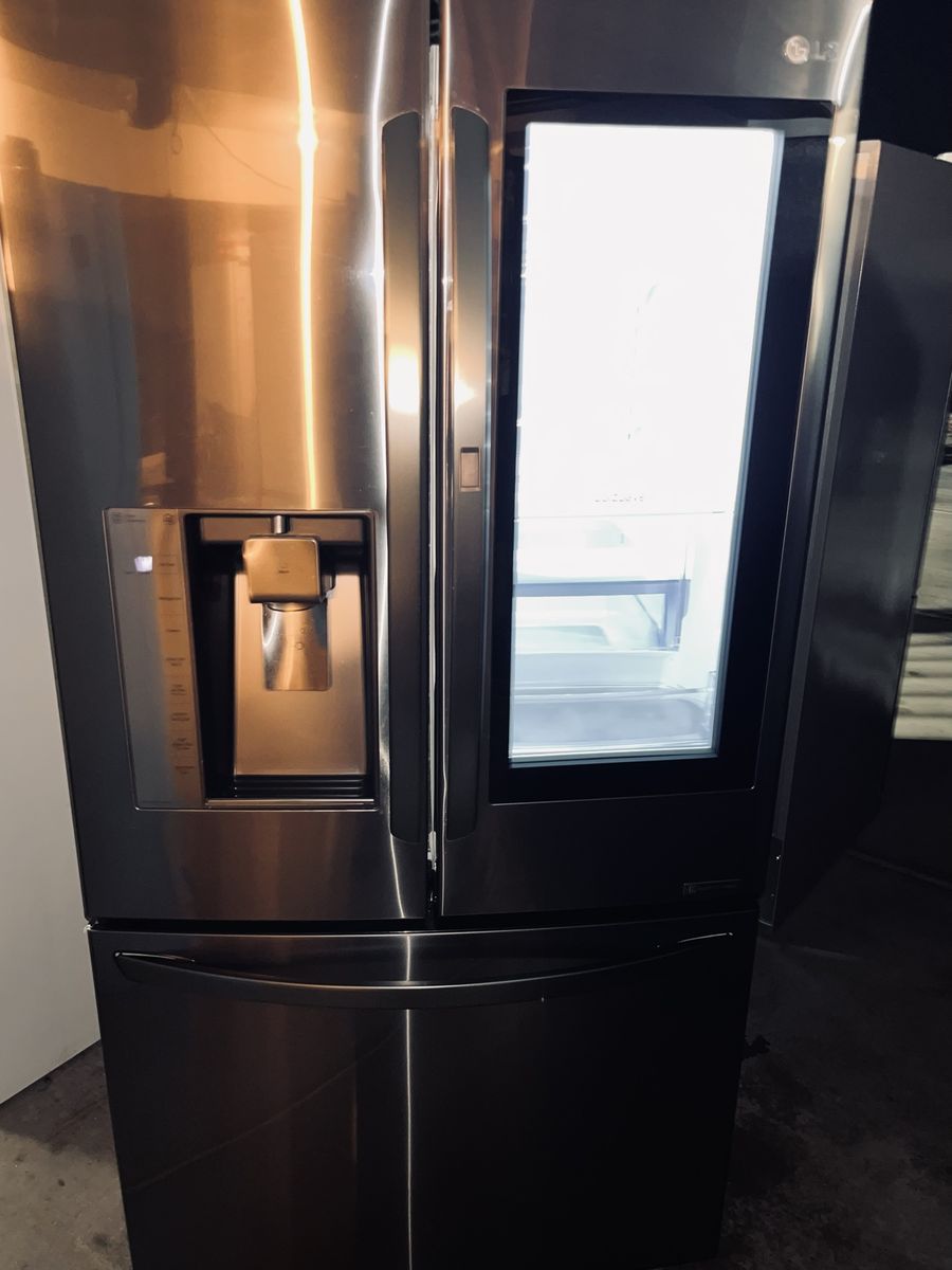 $890 OBO GOOD REFRIGERATOR LG STAINLESS STEEL GLASS DOOR IN DOOR
