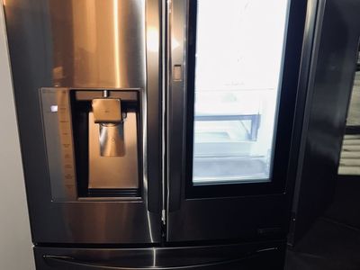 $890 OBO GOOD REFRIGERATOR LG STAINLESS STEEL GLASS DOOR IN DOOR